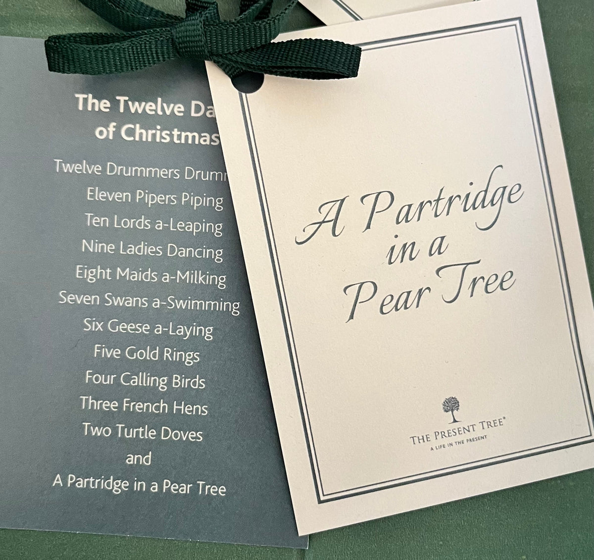 Close up of a card reading 'A Partridge in a Pear Tree'